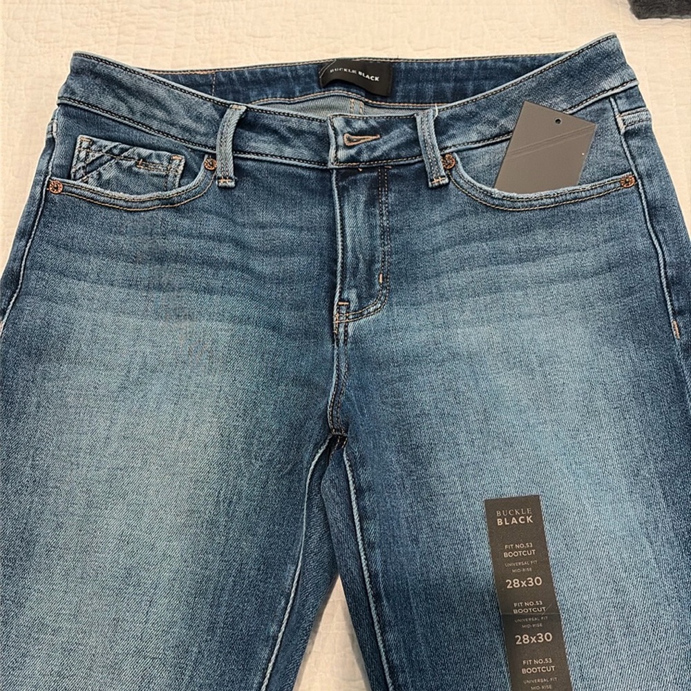 Buckle black bootcut 28x30